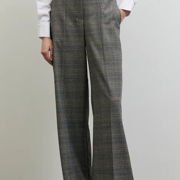 Pantalones de cuadros, con bolsillos, con cierre de cremallera y broche, con cinturón, corte regular.