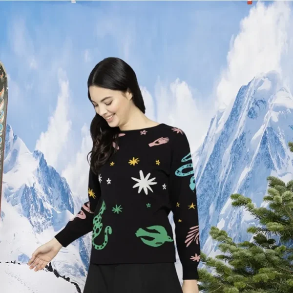 Jersey de dibujos abstractos y animales que llenan de energía la prenda.